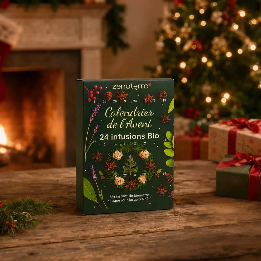 A Zenaterra Advent calendar box for 24 organic infusions stands on a rustic wooden table in a cozy holiday setting with a burning fireplace, a decorated Christmas tree with warm lights, and wrapped gift boxes in the background.
