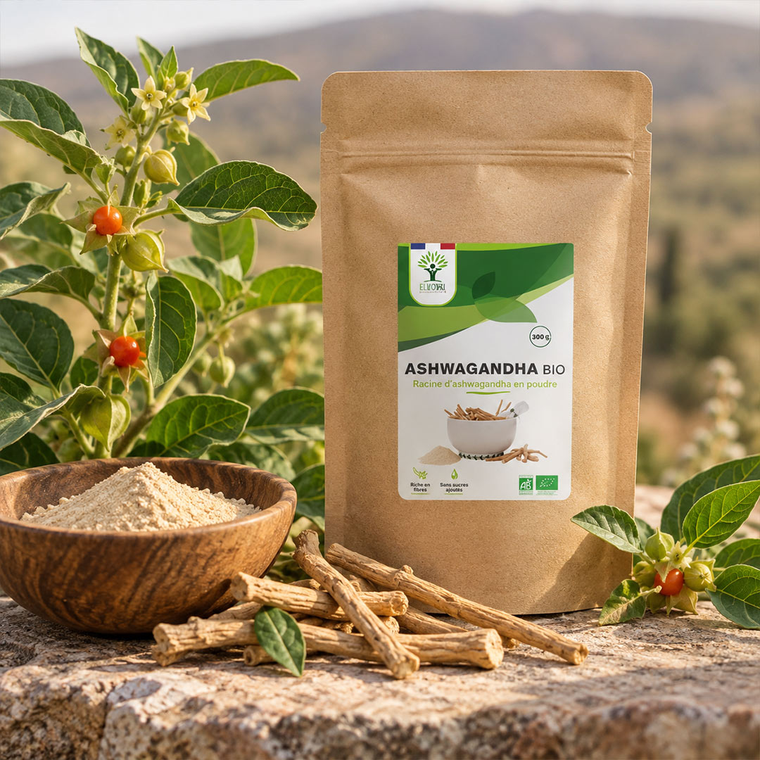 A stand-up pouch of Ashwagandha Bio powder stands on a stone surface outdoors, surrounded by fresh ashwagandha plants, loose root pieces, and a wooden bowl of powder. The pouch label shows the brand 'Bioptimal' and reads 'ASHWAGANDHA BIO'.