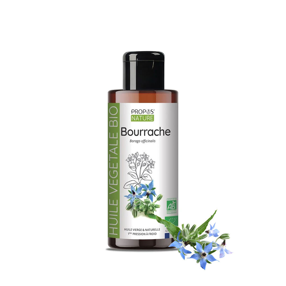 A bottle of Propos Nature Bio Bourrache vegetable oil with a black cap and white label, shown on a white background with blue forget-me-not flowers and green leaves in the foreground.