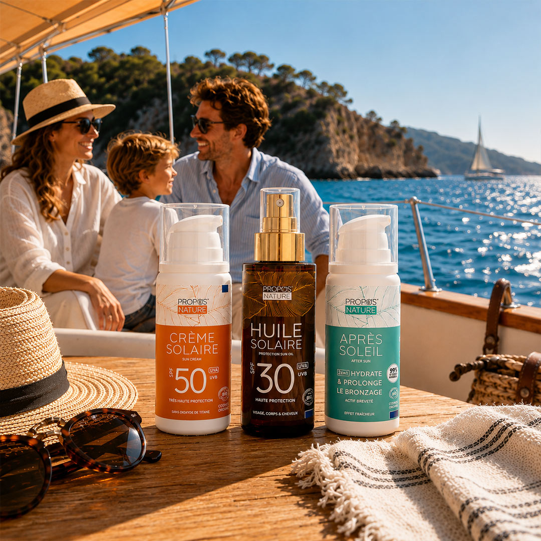 Family on a boat with sunscreen products in the foreground