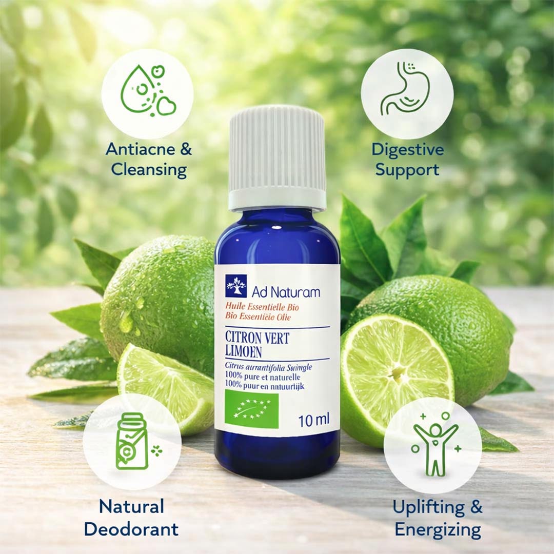 Ad Naturam essential oil bottle with lime fruits on a wooden surface, surrounded by nature.
