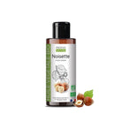 A bottle of Propos Nature Bio Noisette (hazelnut) vegetable oil shown with three hazelnuts and a green leaf on a plain white background.