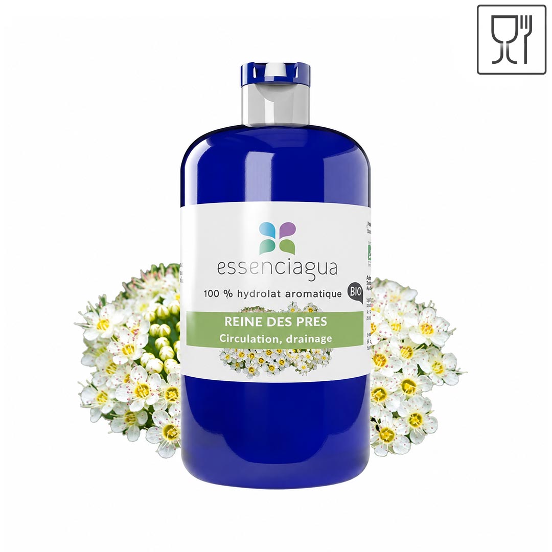 A bottle of essenciágua 100% aromatic fluid with a blue body and white label, flanked by white Meadowsweet flowers on a white background.