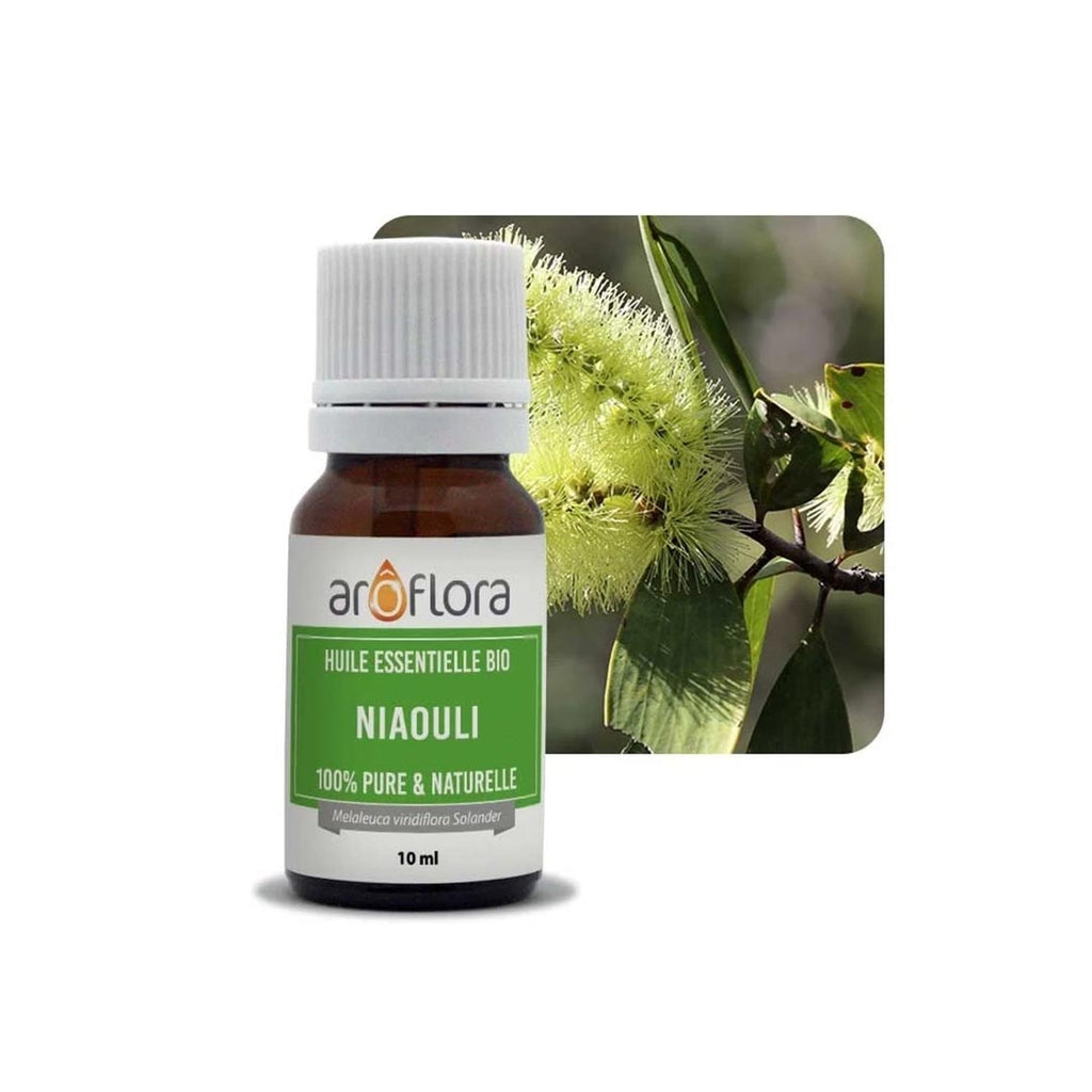 A bottle of Niaouli essential oil from French Aroflora on a background of a niaouli branch 