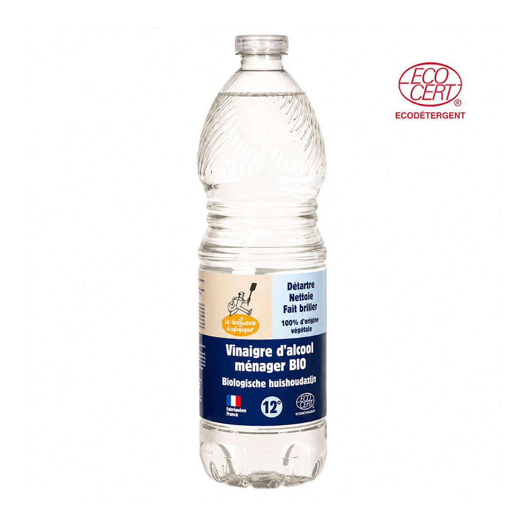 A bottle of white vinegar 12% organic on a white background