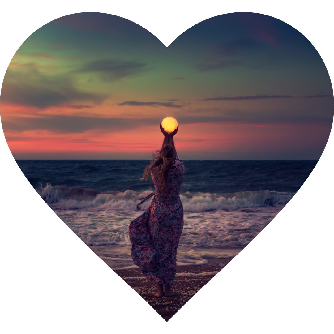 woman holding moon in sunset